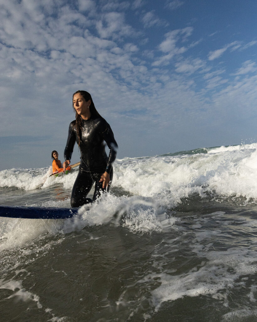 Beginner surfer completing a lesson at Cerritos Beach near Todos Santos